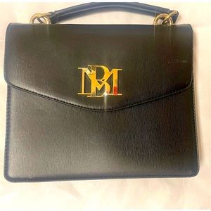 Badgley Mischka purses and handbags  gently used